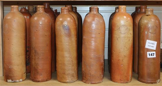 A large collection of Austro-German salt glazed stoneware seltzer mineral water bottles (approx. 27)